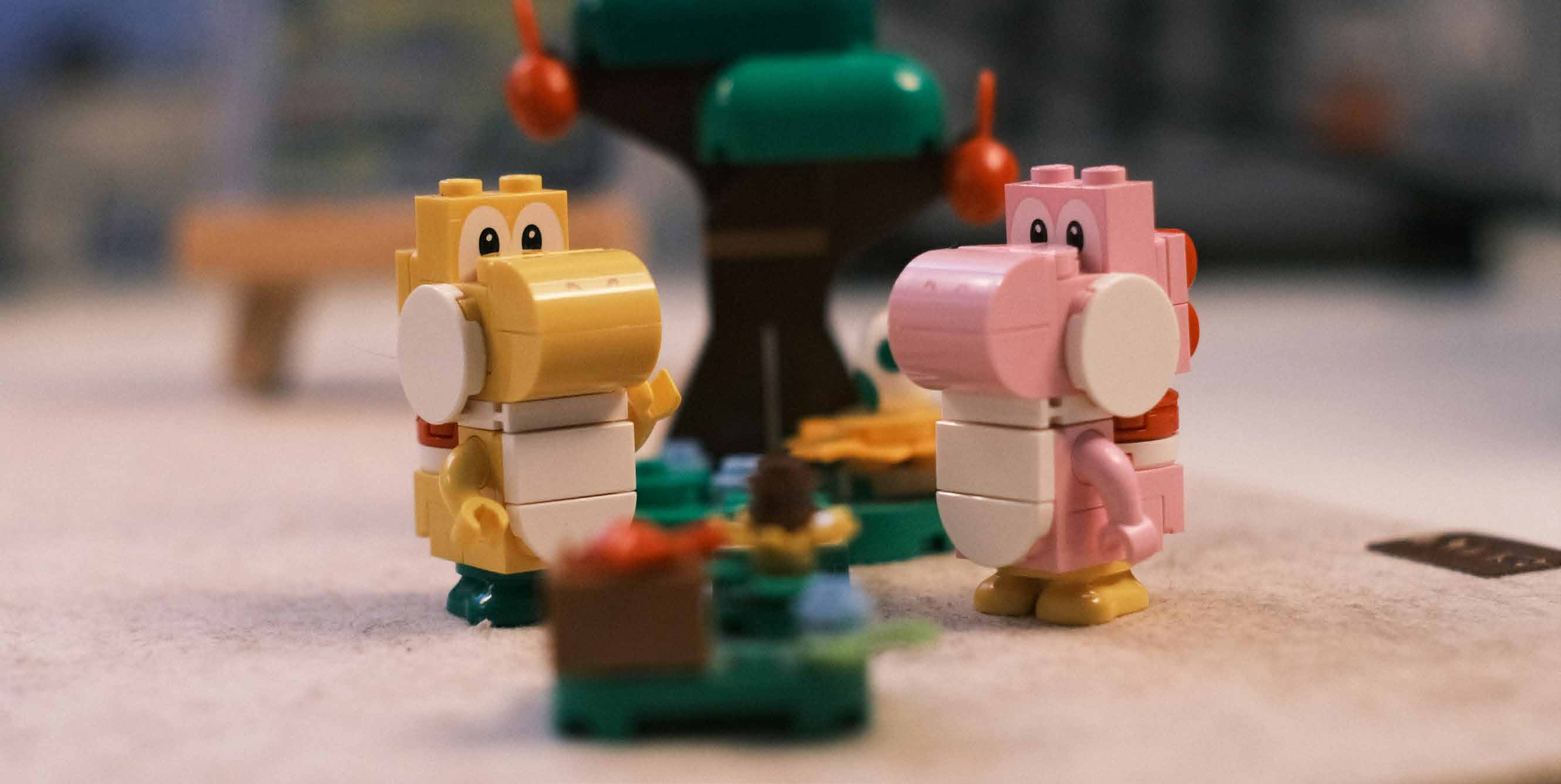 Colourful toy animals together on an early learning playroom table